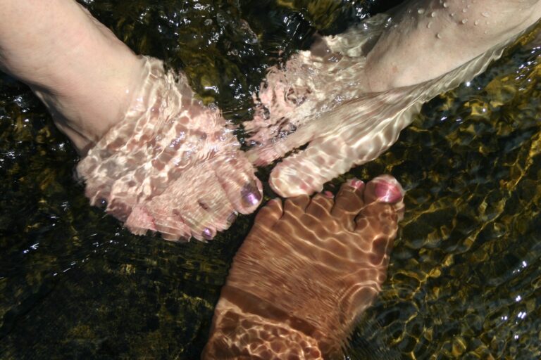 Feet soaking in spa water, background image for why nail fungus keeps coming back